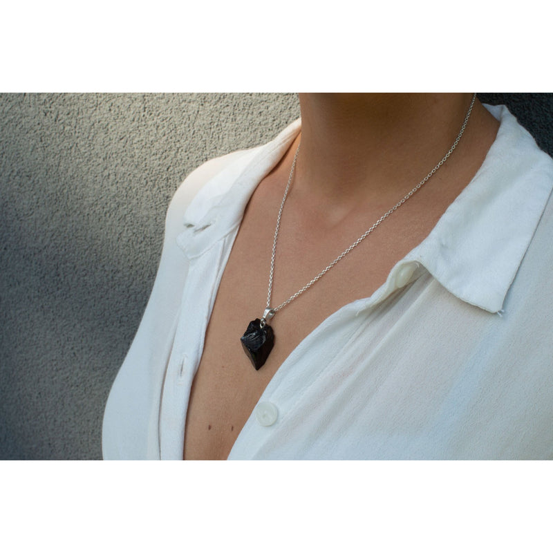 model wearing a shungite necklace